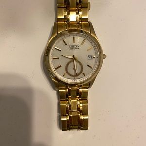 Gold men’s citizen watch